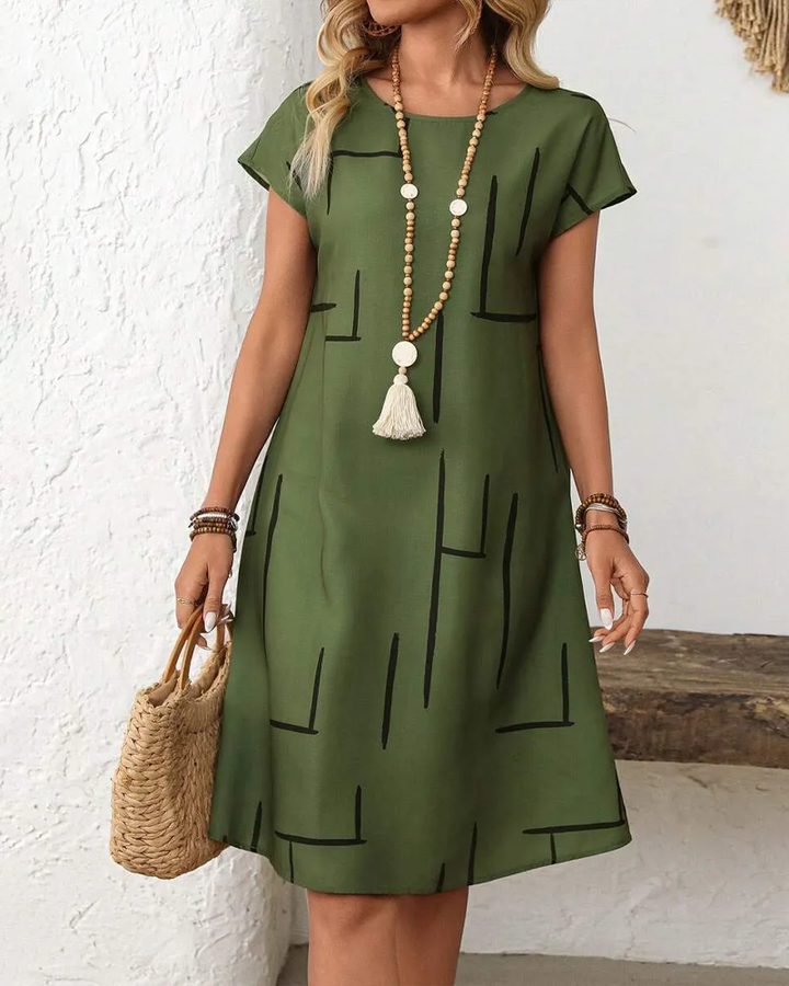 Soline™ | Tummy Concealing Dress with Line Print