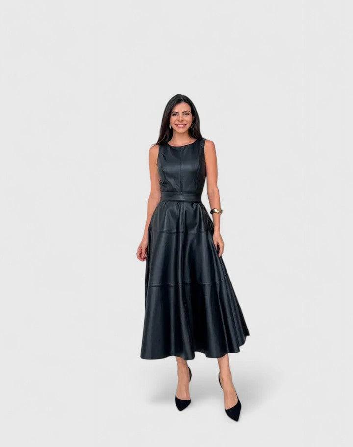Elegant Rylie™ dress by Emma & Rose Cape Town, shown in a flowing fabric with intricate detailing and a flattering silhouette.