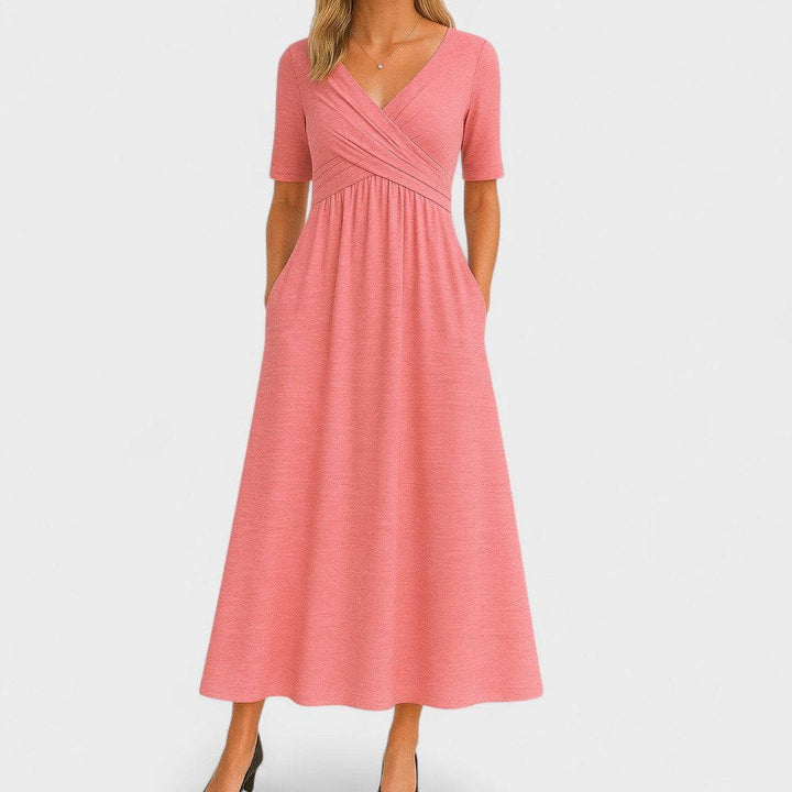 Elegant Phoebe™ midi dress by Emma & Rose Cape Town featuring a flowing silhouette and intricate detailing.