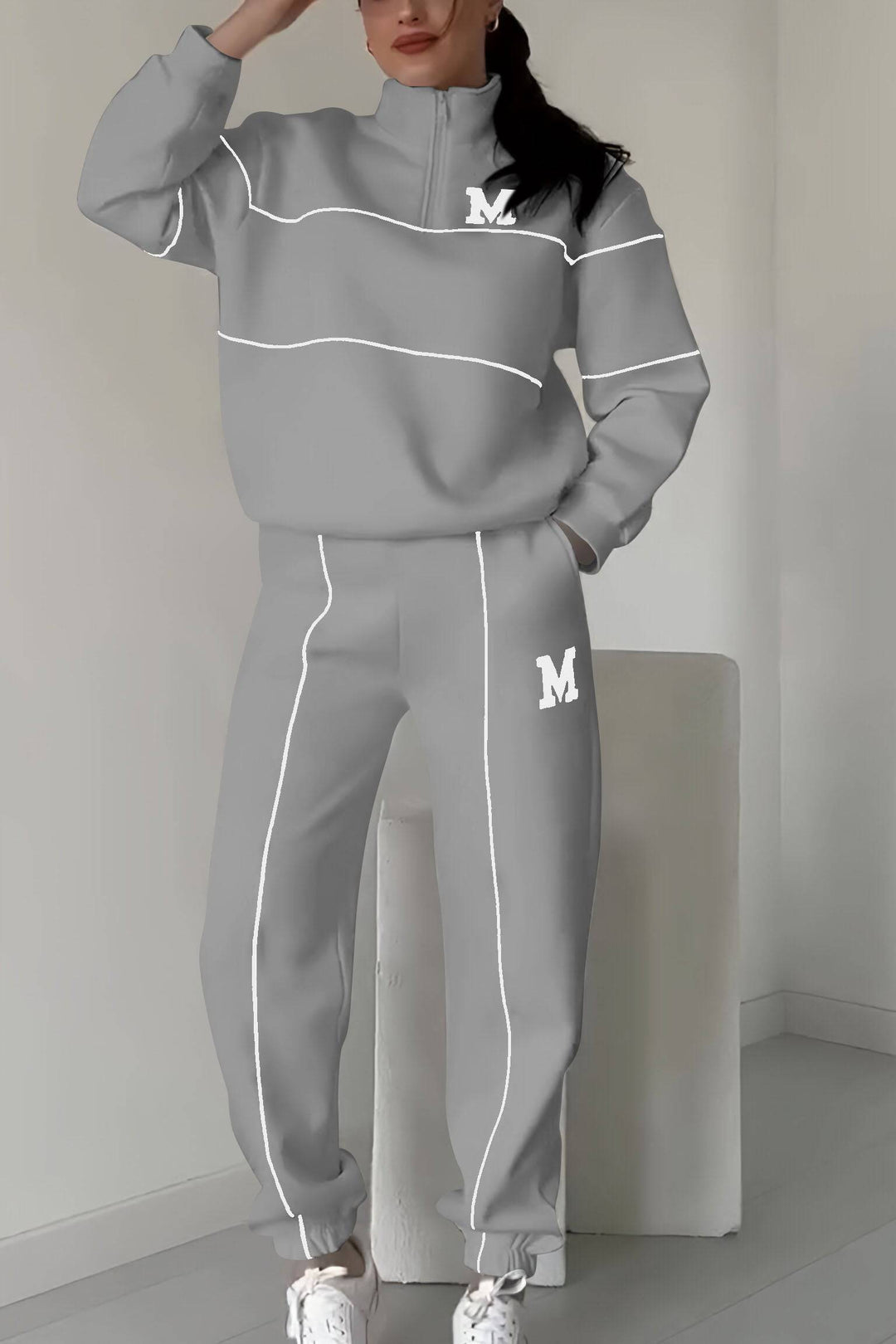 Thalynnae™ sweater and trousers set by Emma & Rose Cape Town, featuring a cozy knit sweater with matching trousers.