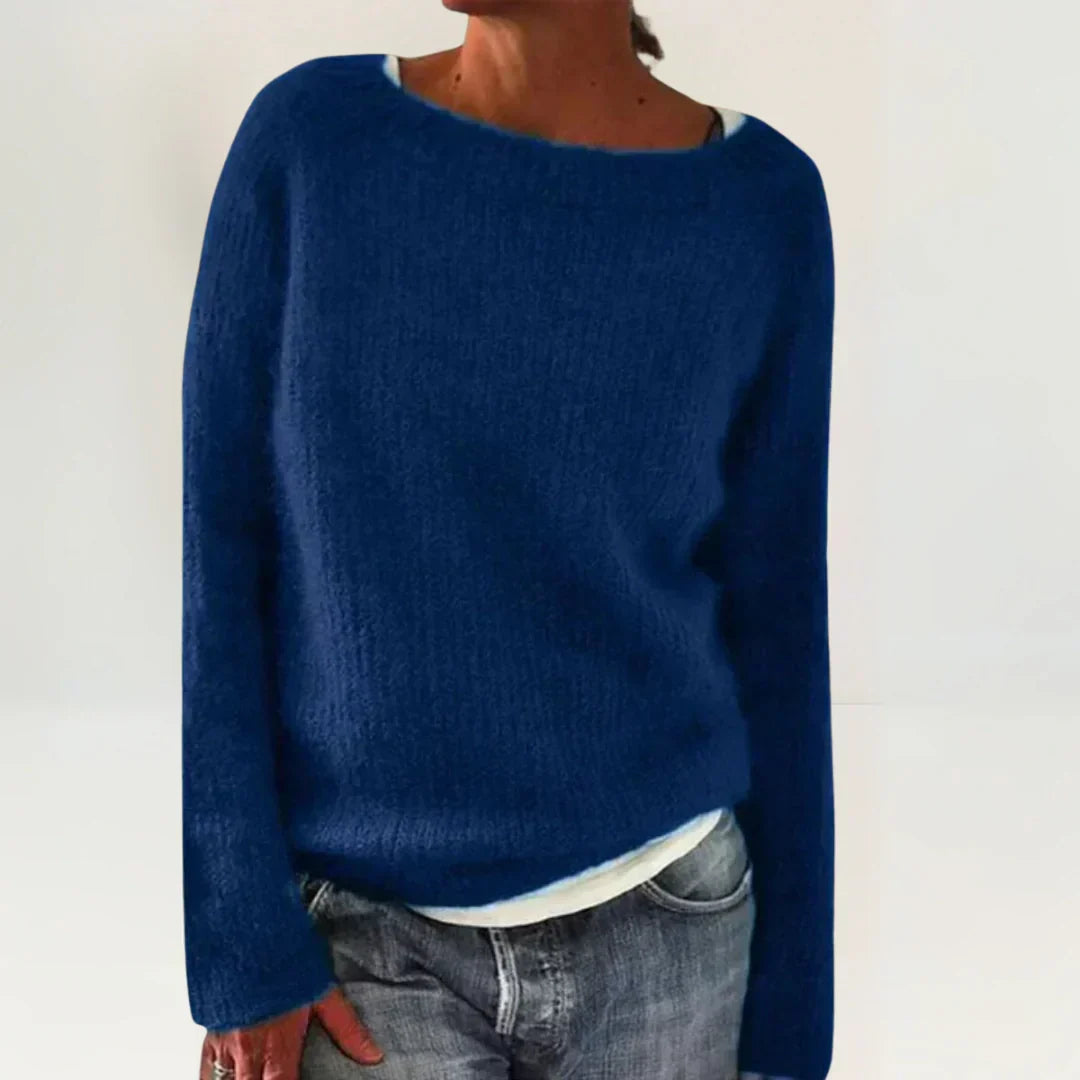 Blue cozy sweater by Emma & Rose Cape Town, featuring soft knit fabric and a relaxed fit, ideal for casual wear.