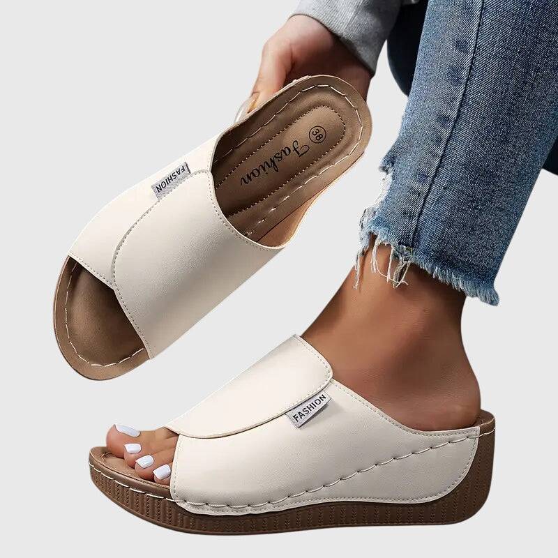 Emma & Rose Cape Town Esther™ orthopedic wedge sandals featuring tan leather straps and a supportive wedge heel.
