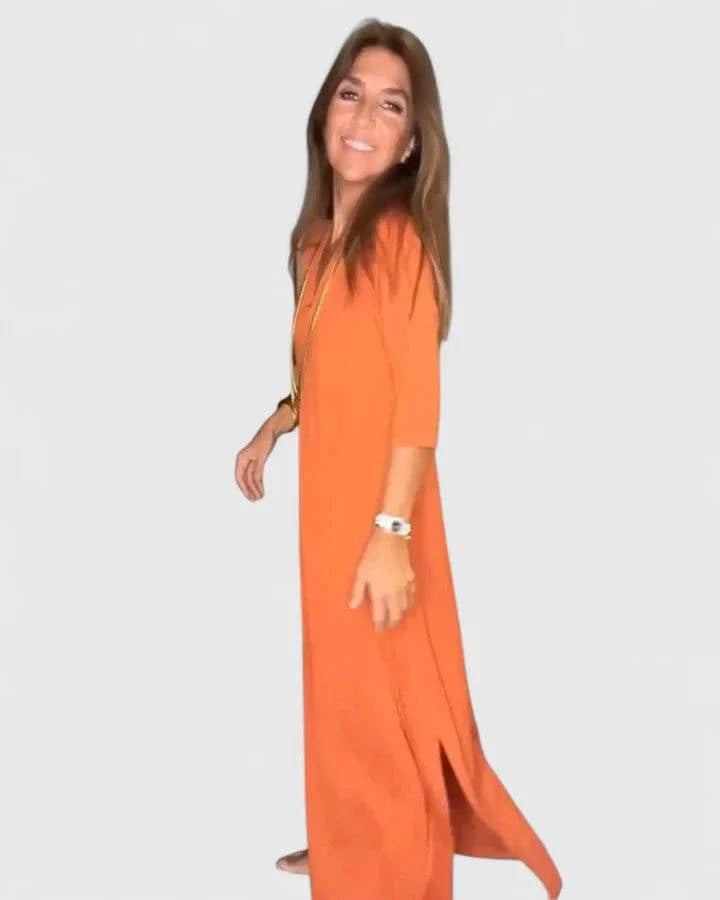 Elegant Olyvianne™ dress by Emma & Rose Cape Town, featuring a flowing design with intricate details and a stylish silhouette.