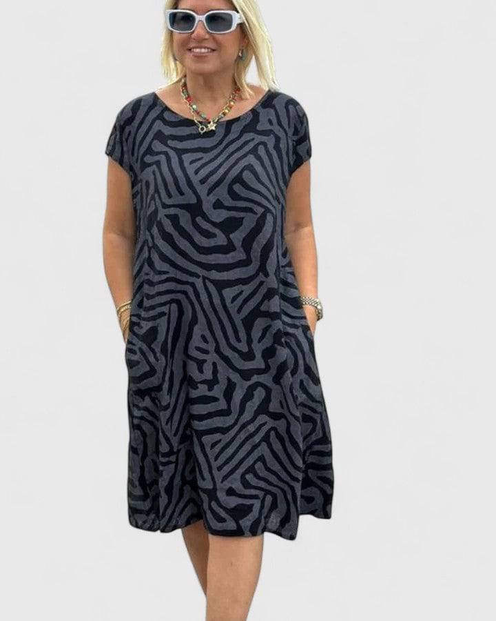 Calyviah™ comfortable dress by Emma & Rose Cape Town, featuring a stylish, flowing design in soft fabric.