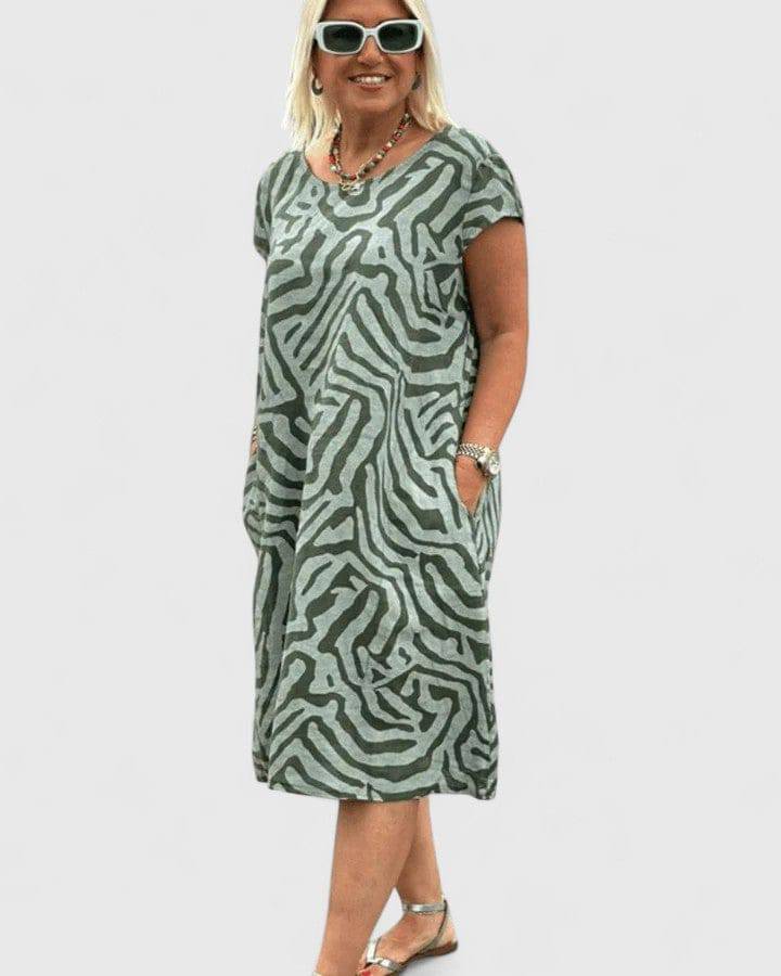 Calyviah™ comfortable dress by Emma & Rose Cape Town, shown in a casual fit with soft fabric and stylish design.