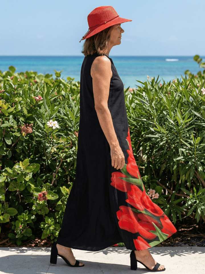Emma & Rose Cape Town Cylia™ Soft Rose Maxi Dress featuring flowing fabric and elegant design, displayed on a hanger.