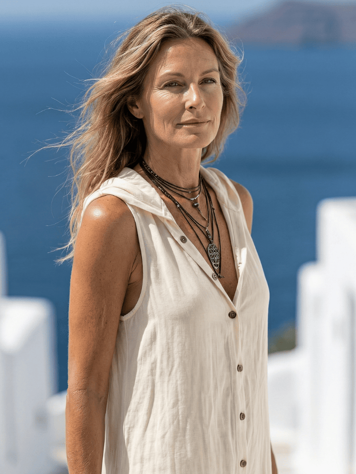 Marune™ front hooded maxi dress by Emma & Rose Cape Town, showcasing a stylish hooded design and flowing fabric.