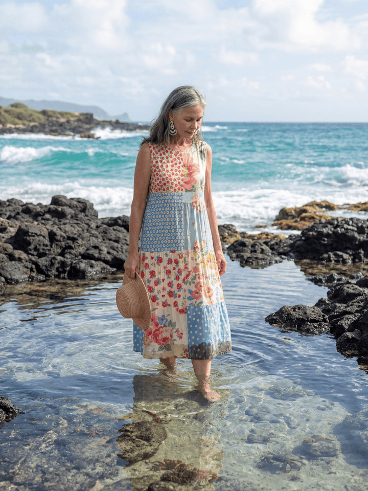Kira™ Coastal Floral Midi Dress by Emma & Rose Cape Town featuring a flowy silhouette and vibrant floral pattern.