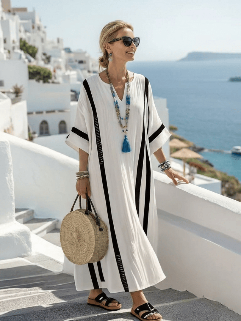 Elvienne™ block striped maxi dress by Emma & Rose Cape Town, featuring a flowing silhouette and bold horizontal stripe pattern.