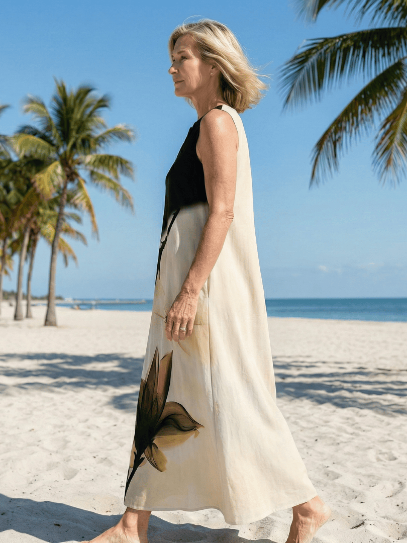 Seraya™ Gentle Fall Maxi Dress by Emma & Rose Cape Town, featuring flowy fabric and seasonal autumn colors.