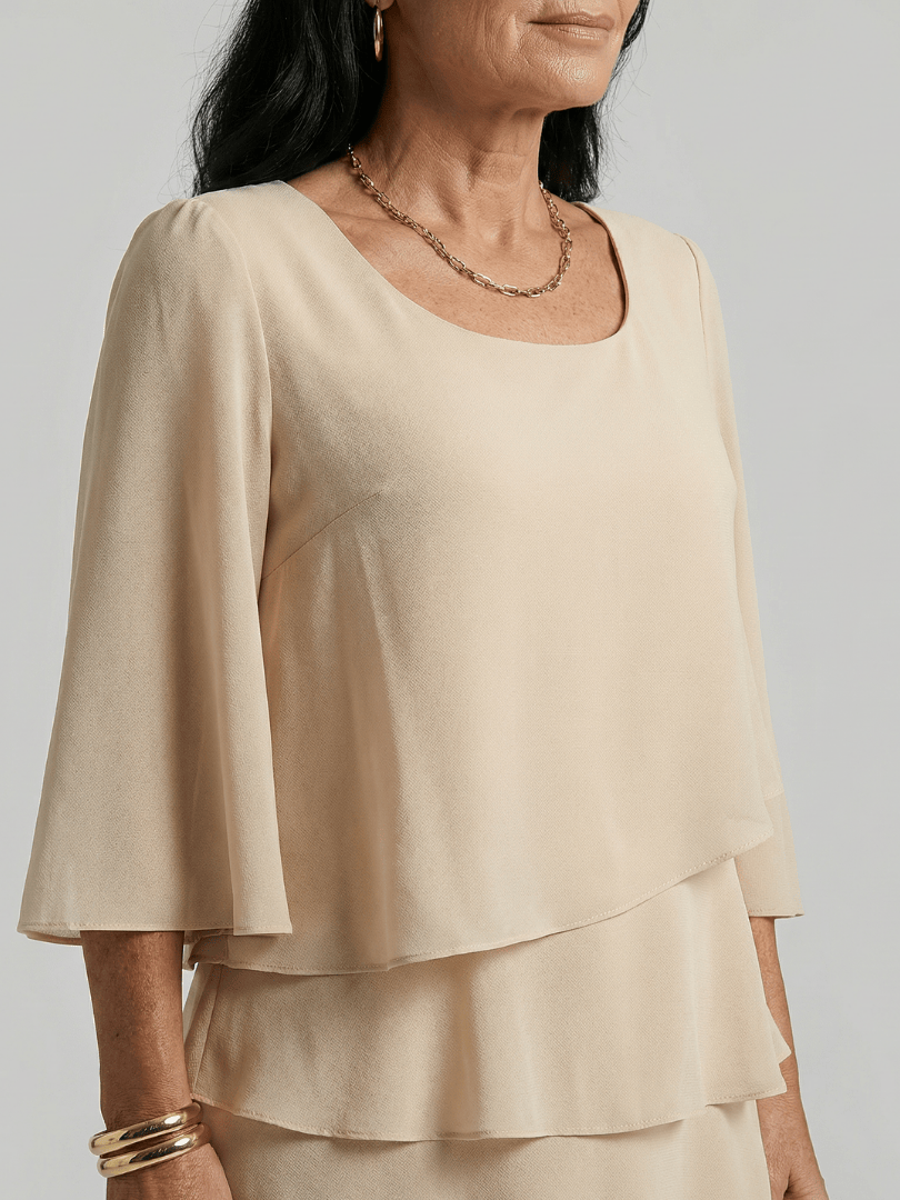 Della™ sleeve knee-length dress by Emma & Rose Cape Town, featuring a fitted silhouette and elegant design.