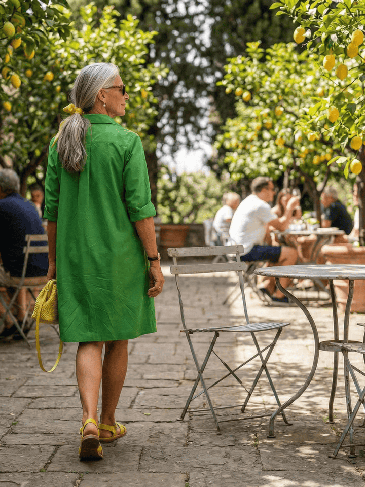 Giselle™ Morning Garden Dress by Emma & Rose Cape Town featuring floral print, flowing fabric, and elegant design