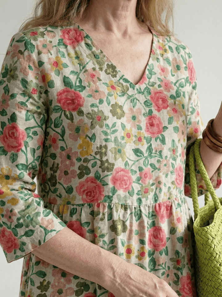 Emma & Rose Cape Town Colin™ Scatter Flower Midi Dress with a floral pattern and midi length, shown in the image.
