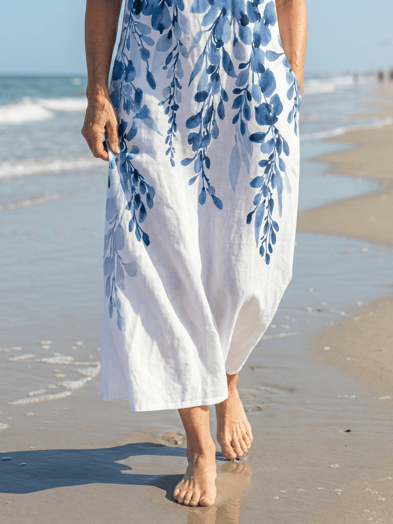 Emma & Rose Cape Town Azura™ Chill Breeze Maxi Dress in lightweight, flowy fabric with floral pattern and adjustable straps.