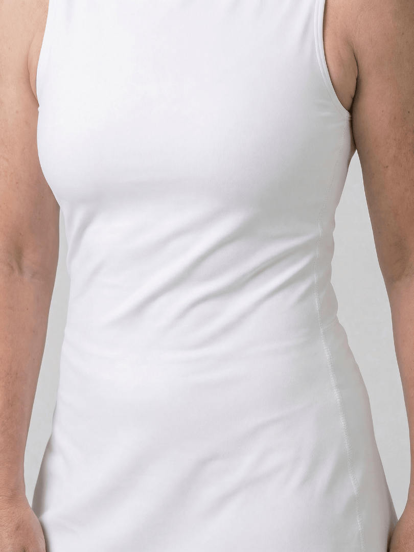 Irie™ neck flared tennis dress by Emma & Rose Cape Town, shown with a fitted bodice and flared skirt, perfect for active wear.