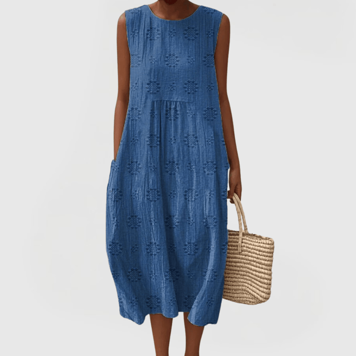 Emma & Rose Cape Town Teresa™ elegant dress featuring stylish integrated pockets and a flattering silhouette.