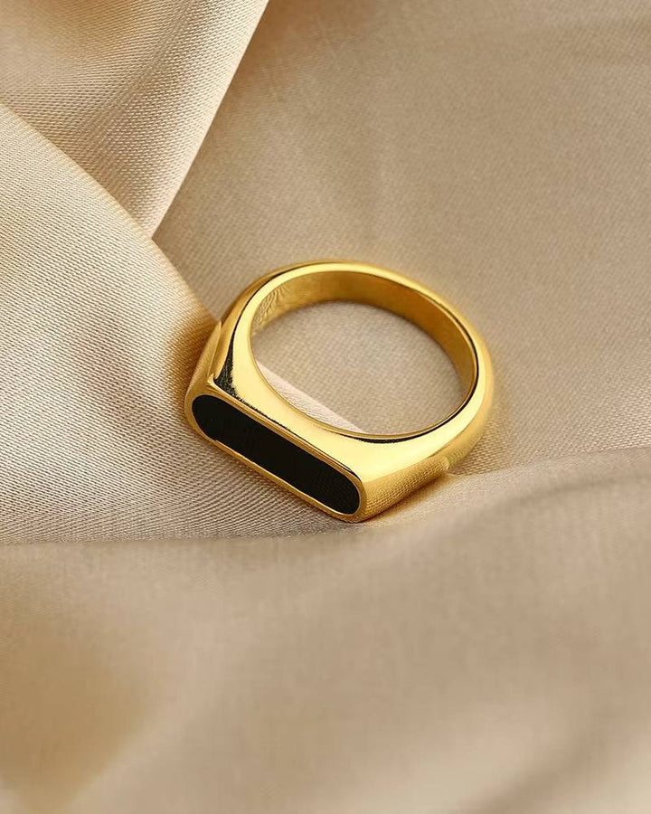 Emma & Rose Manhattan Marco™ Obsidian Ring featuring a sleek black obsidian stone and minimalist silver band.