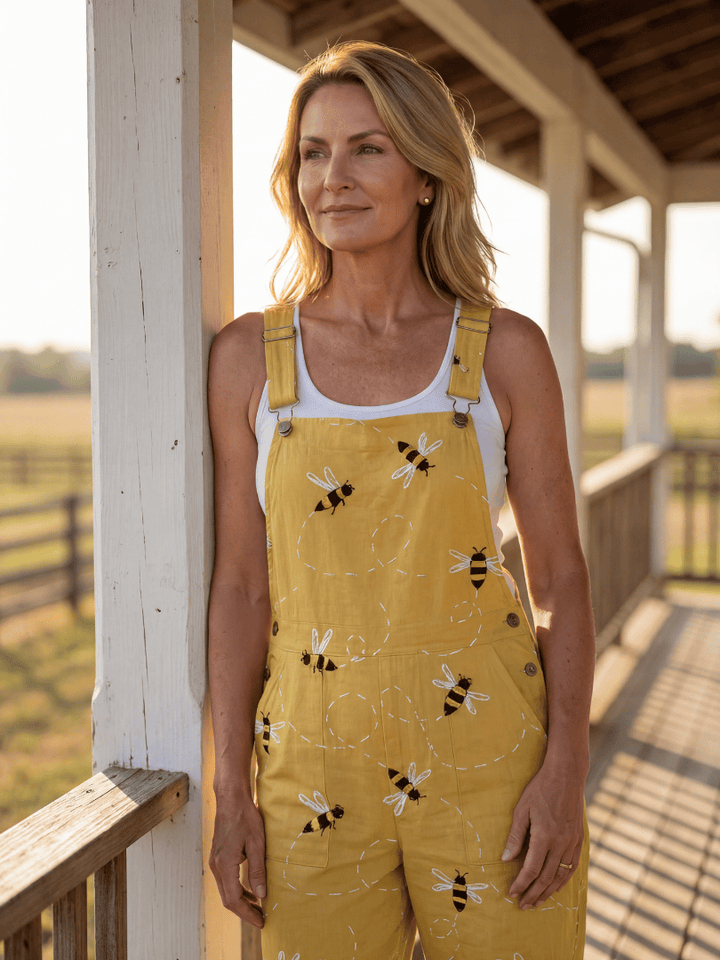 Petra™ Light Honeybee Jumpsuit by Emma & Rose Cape Town, featuring a stylish, lightweight fabric with honeybee print and adjustable straps.