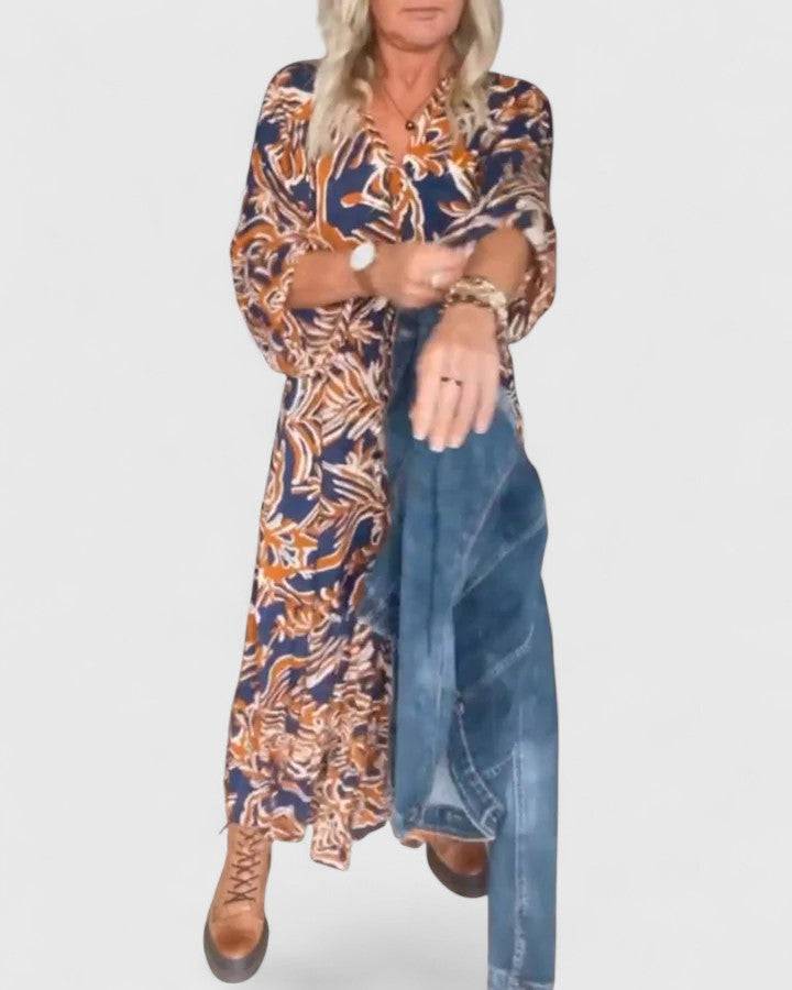 Emma & Rose Cape Town Julee™ maxi dress featuring a sophisticated design with flowing fabric and elegant neckline.