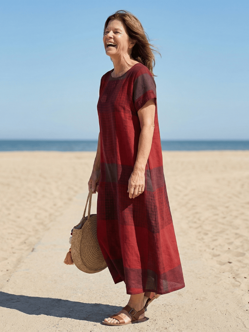 Alaia™ Relaxed Line Midi Dress by Emma & Rose Cape Town, showcasing a flowy, relaxed fit with midi length and elegant design.