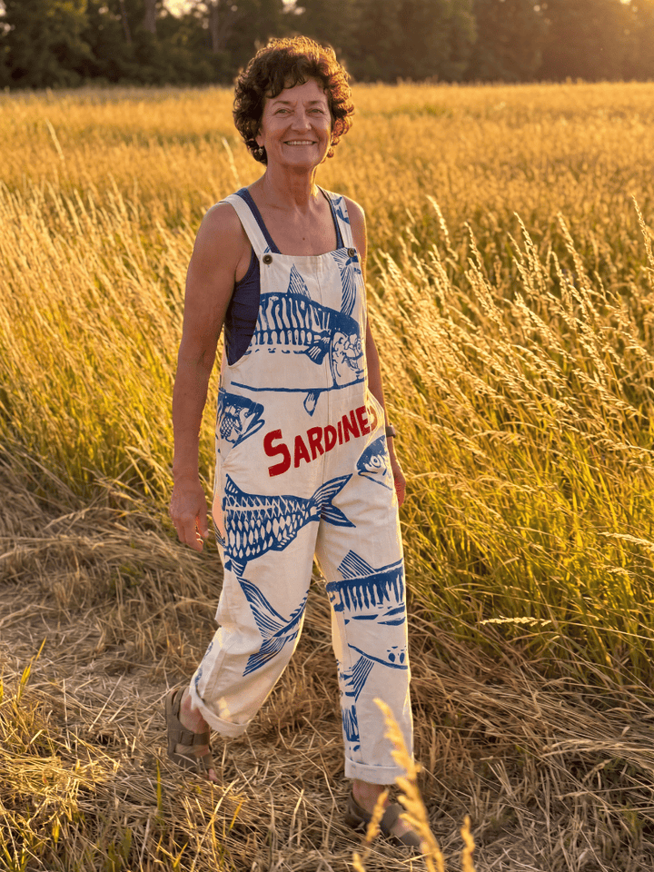 Emma & Rose Cape Town Zuri™ fish motif jumpsuit featuring a playful fish pattern and comfortable fit for casual wear.