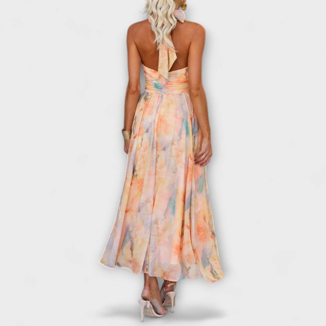Elegant Ariellea™ dress by Emma & Rose Cape Town, featuring a stylish design and flowing fabric, shown on a model.