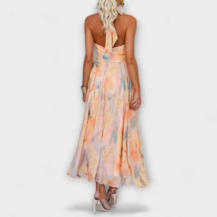 Elegant Ariellea™ dress by Emma & Rose Cape Town, featuring a stylish design and flowing fabric, shown on a model.