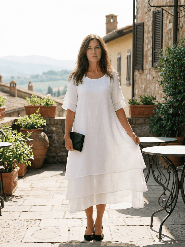 Soft layered Belen™ dress by Emma & Rose Cape Town featuring flowing fabric and elegant design, perfect for casual or formal wear.