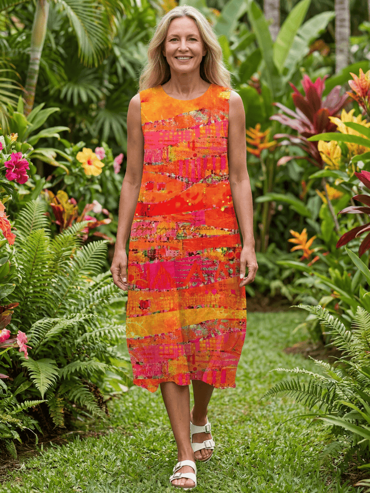 Leilani™ Painted Path midi dress by Emma & Rose Cape Town, featuring a flowy silhouette with vibrant floral patterns.