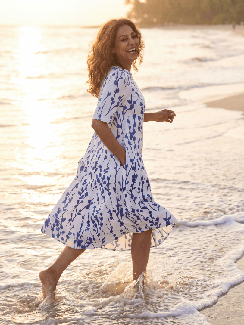 Miles™ Floral Midi Dress by Emma & Rose Cape Town, featuring a vibrant floral pattern and flowing midi length fabric.