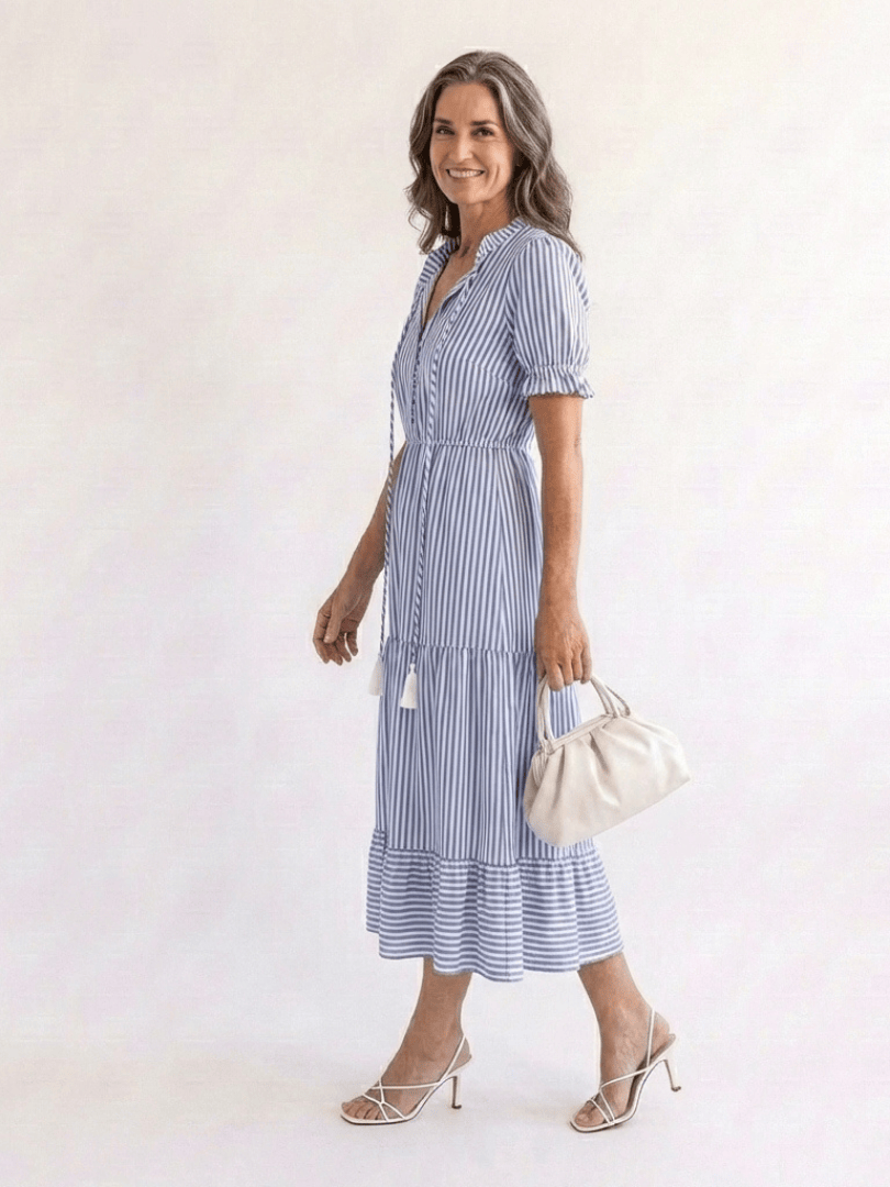 Emma & Rose Cape Town Dakota™ striped tiered midi dress with flowing fabric and stylish pattern, perfect for casual or semi-formal wear.