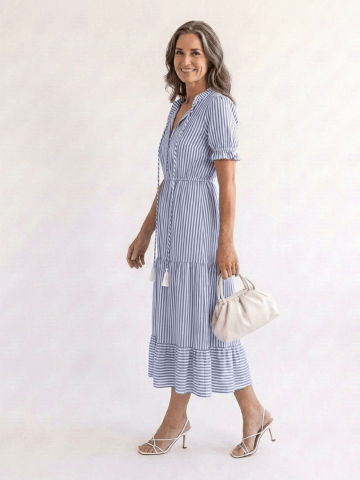 Emma & Rose Cape Town Dakota™ striped tiered midi dress with flowing fabric and stylish pattern, perfect for casual or semi-formal wear.