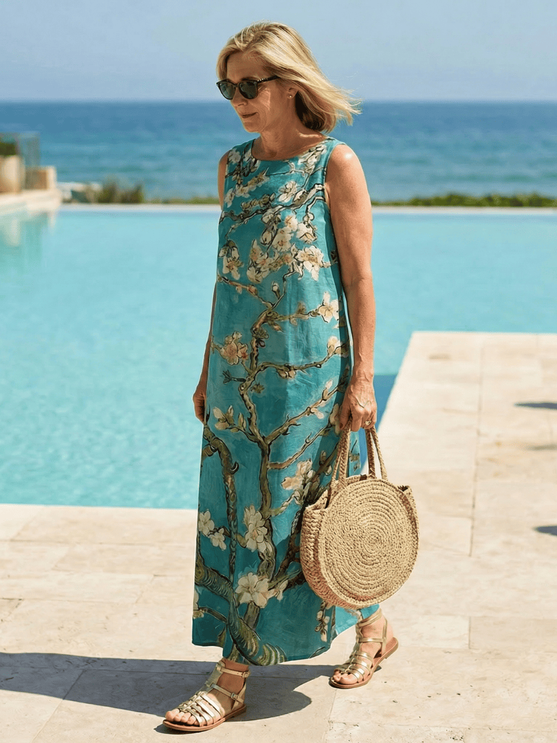 Emma & Rose Cape Town Calistae™ Soft Line Midi Dress in flowing fabric with a fitted waist and elegant design.