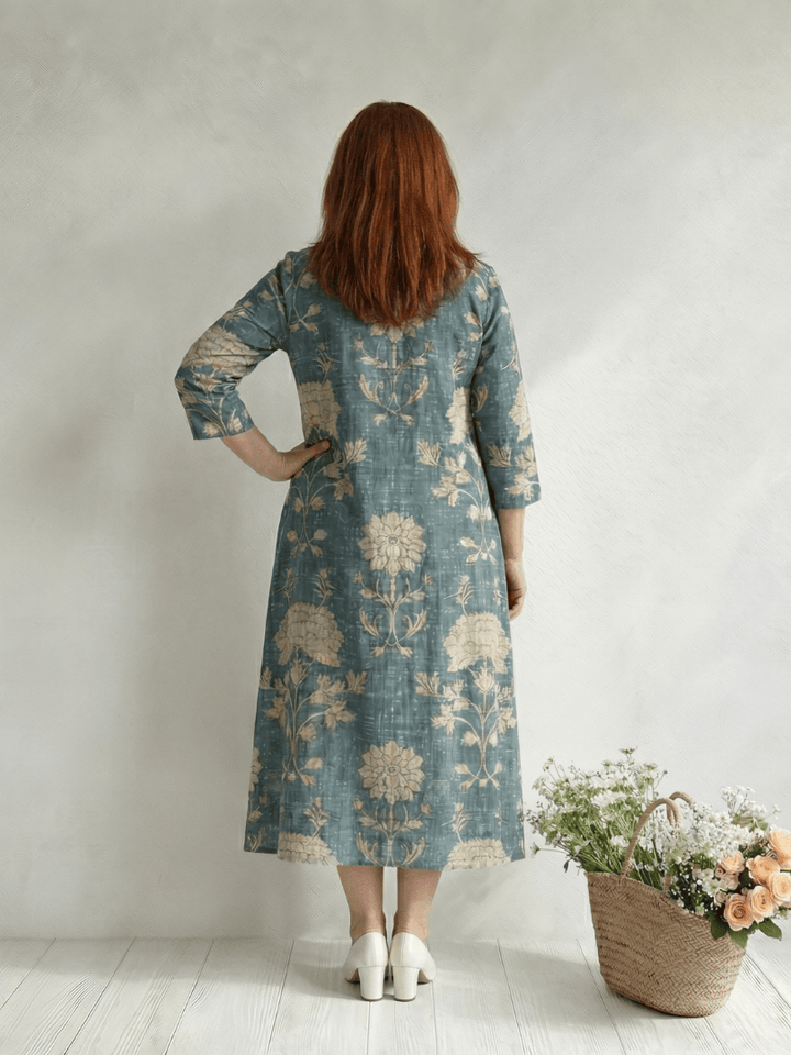 Skye™ Shape Floral Midi Dress by Emma & Rose Cape Town featuring a fitted bodice and flowing floral print fabric.