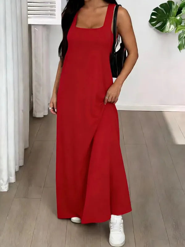Long women's dress with a two-piece effect and side cutouts