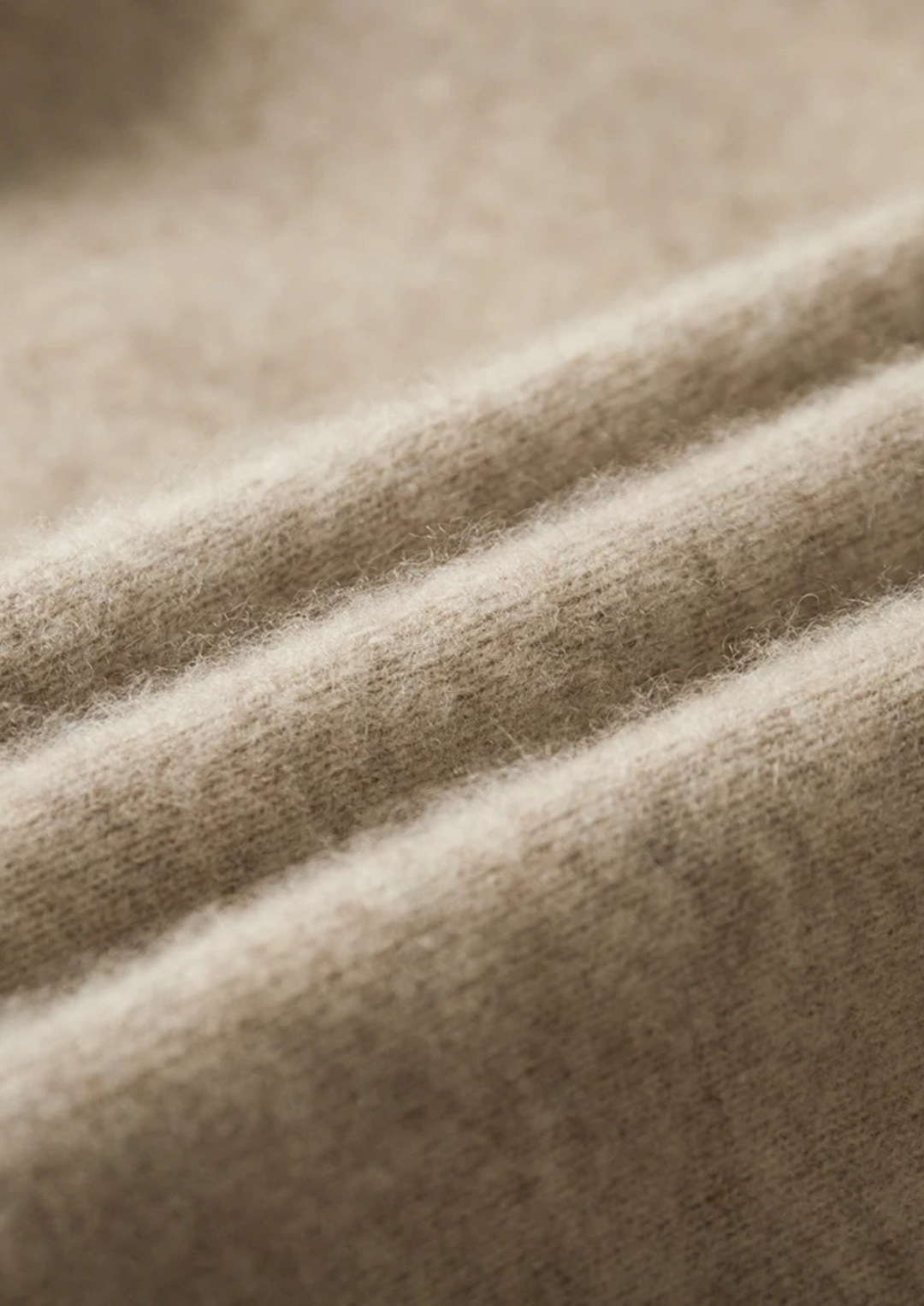 100% CASHMERE ZIP POLO CARDIGAN.