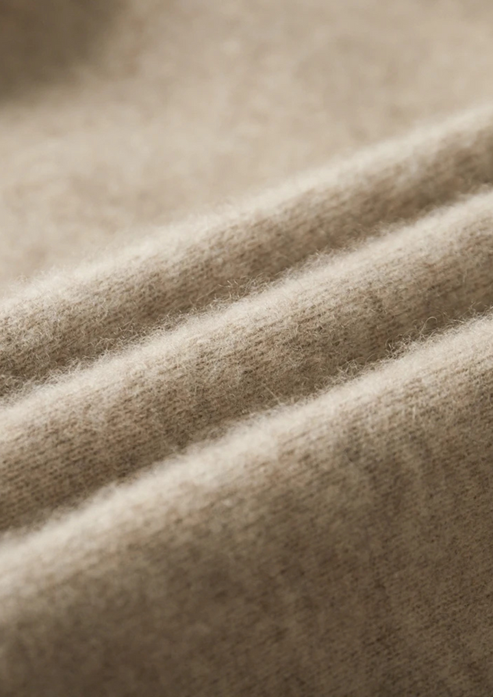 100% CASHMERE ZIP POLO CARDIGAN.