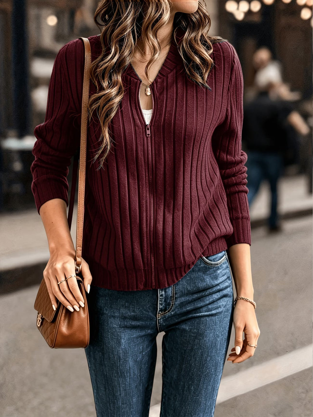 Ribbed women's cardigan with zip closure