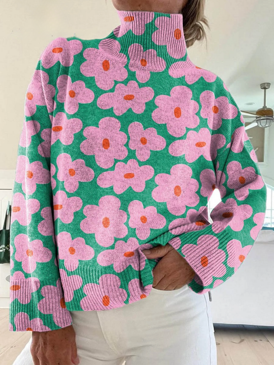 Floral knit sweater from Emma & Rose Cape Town featuring colorful flower patterns and cozy fabric.