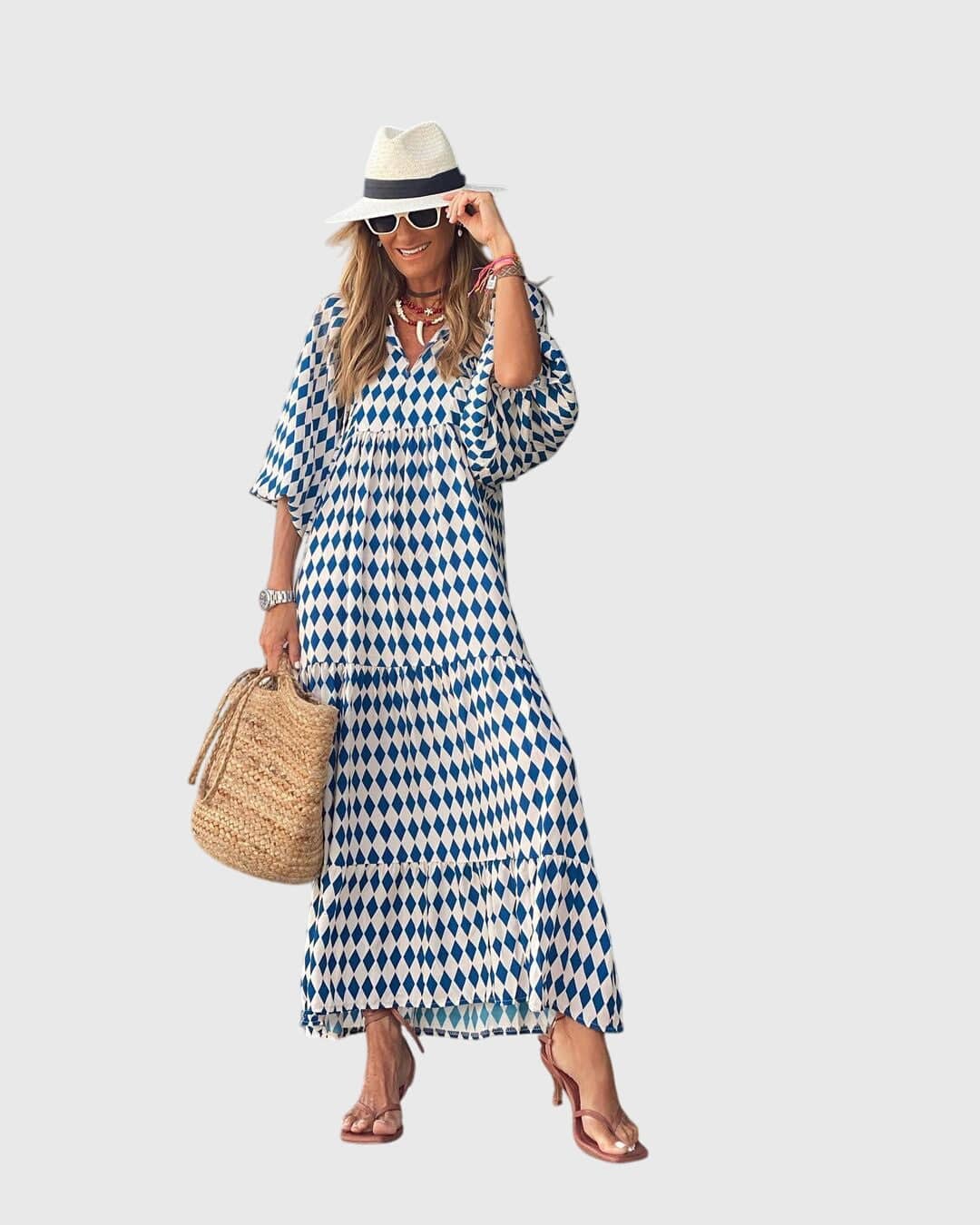 Sarah™ Boho Maxi Dress by Emma & Rose Cape Town, flowing fabric and bohemian style, shown in a vibrant, patterned design.