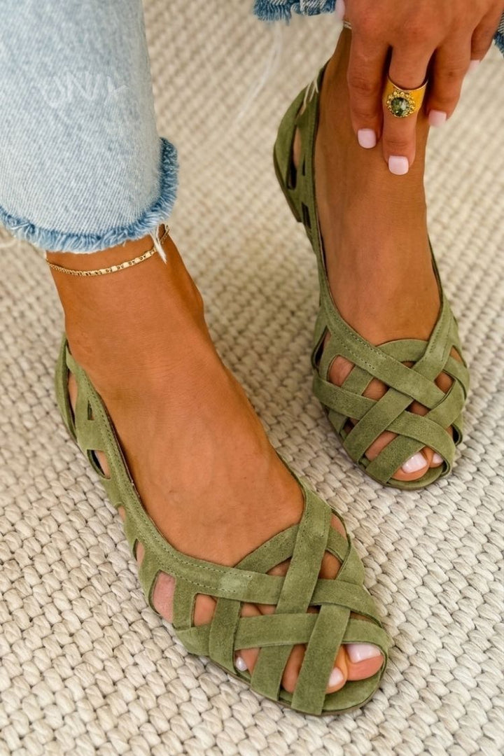 Flat open-toe sandals with woven fabric