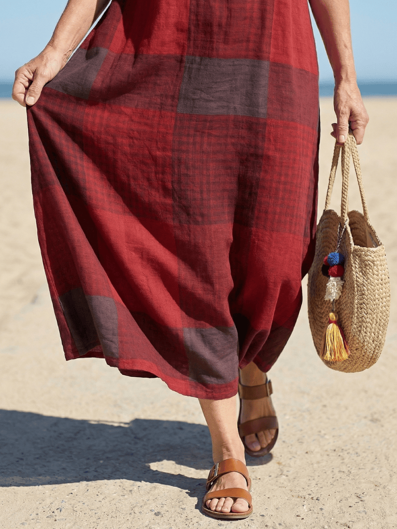 Alaia™ Relaxed Line Midi Dress by Emma & Rose Cape Town, showcasing soft fabric, relaxed fit, and elegant midi length.
