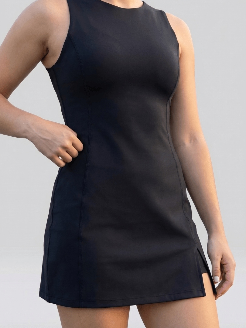 Fayen™ Side Slit Tennis Dress by Emma & Rose Cape Town, featuring a fitted silhouette and stylish side slit for active wear.