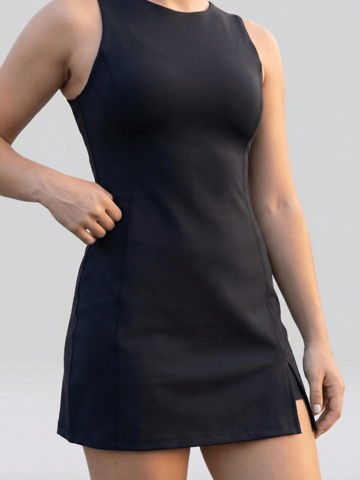 Fayen™ Side Slit Tennis Dress by Emma & Rose Cape Town, featuring a fitted silhouette and stylish side slit for active wear.
