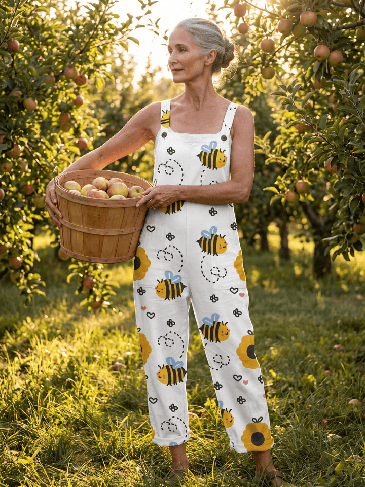 Emma & Rose Cape Town Moxie™ Bee Flower jumpsuit with vibrant floral pattern and adjustable straps on a mannequin.