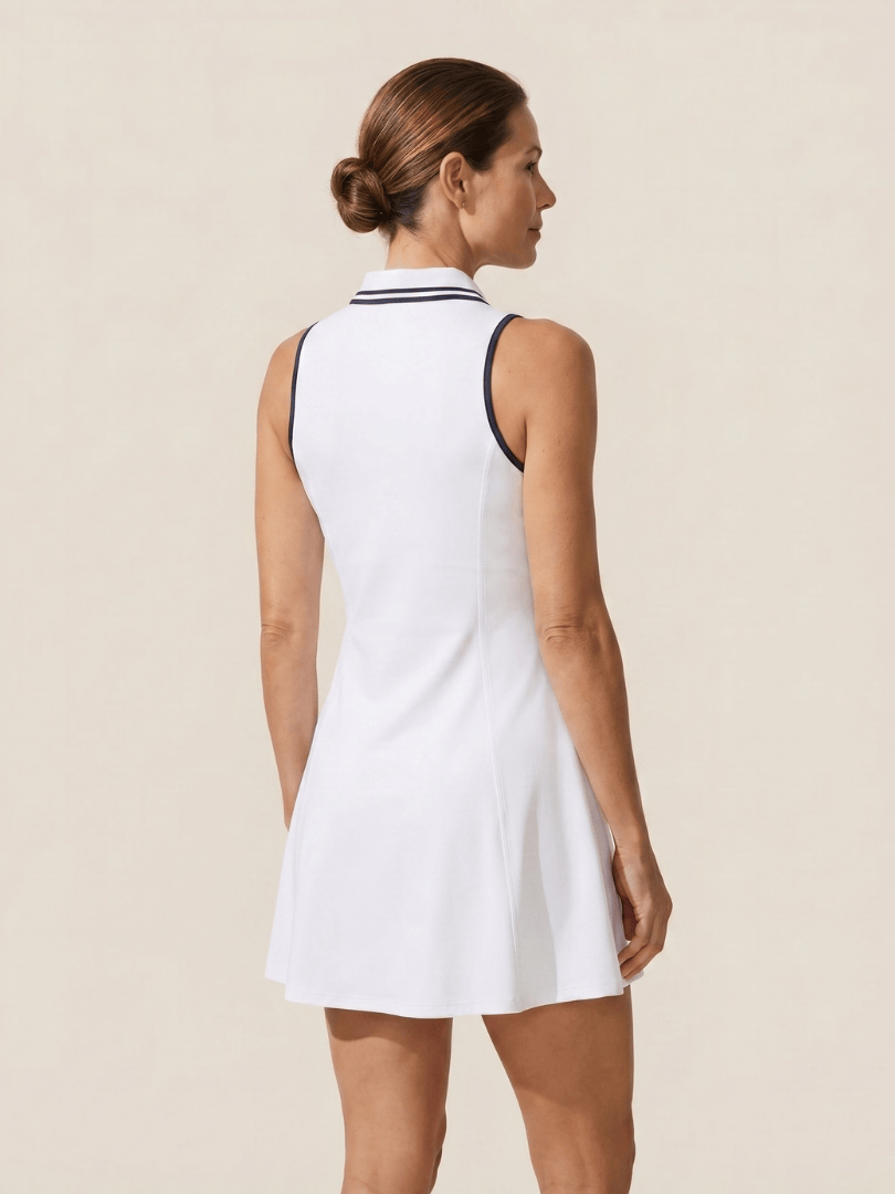Anise™ Zip Collar Tennis Dress by Emma & Rose Cape Town, featuring a sporty fit, zip collar, and breathable fabric for active wear.