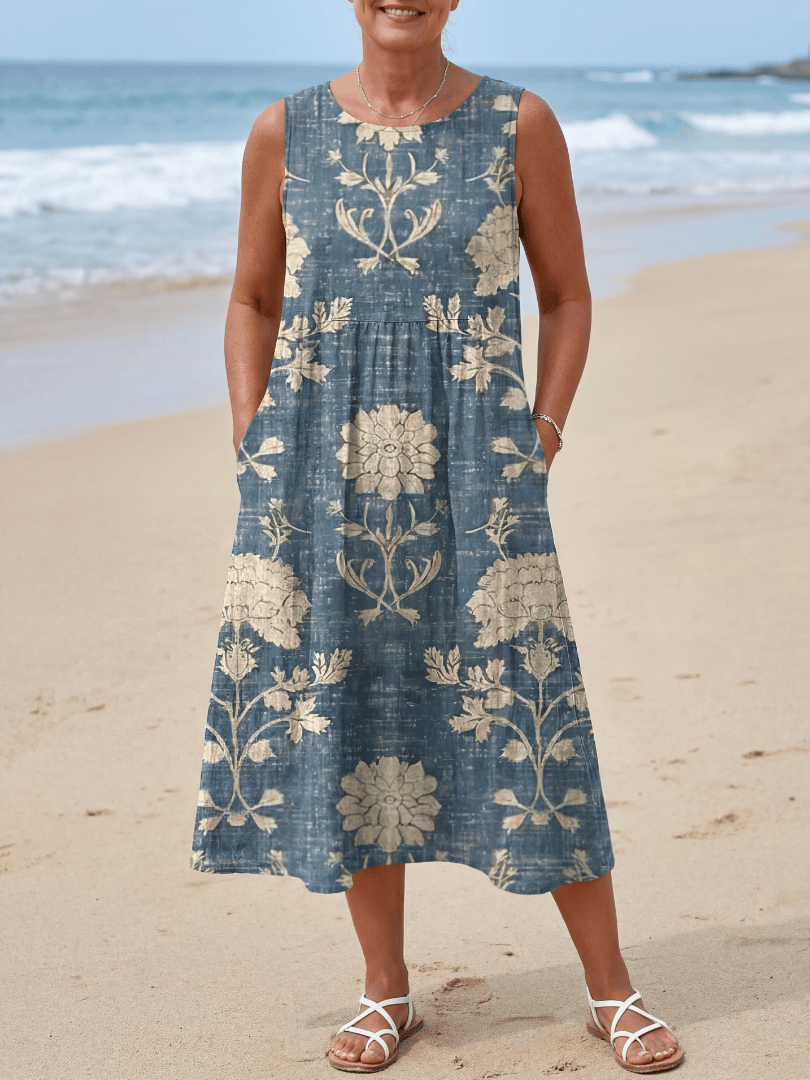 Emma & Rose Cape Town Kailo Shoreline Floral Midi Dress featuring a colorful floral pattern and flowing fabric.