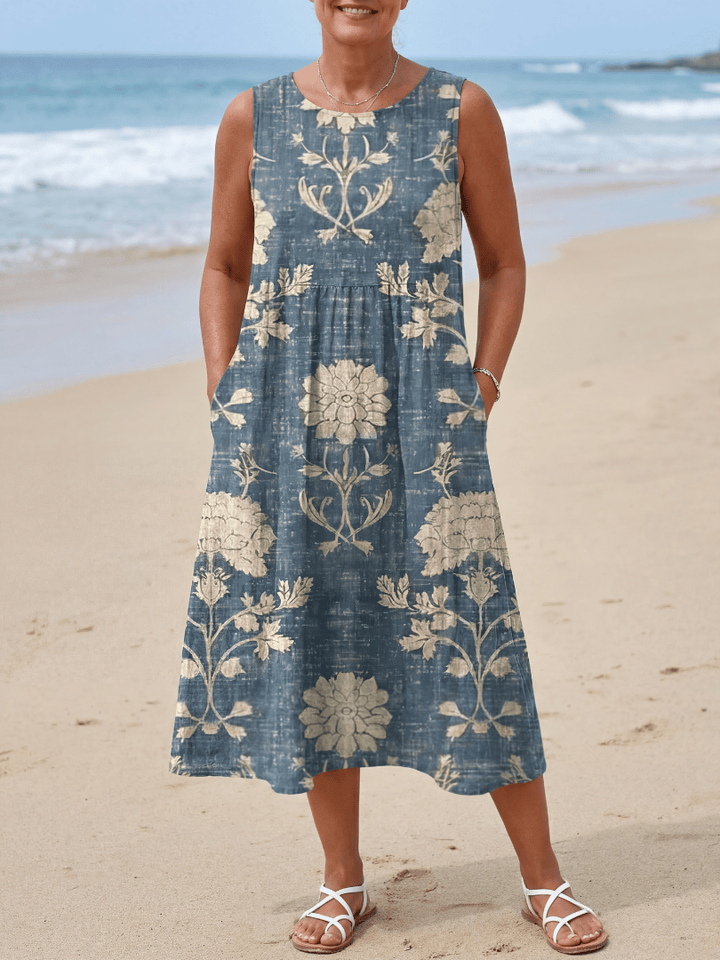 Emma & Rose Cape Town Kailo Shoreline Floral Midi Dress featuring a colorful floral pattern and flowing fabric.