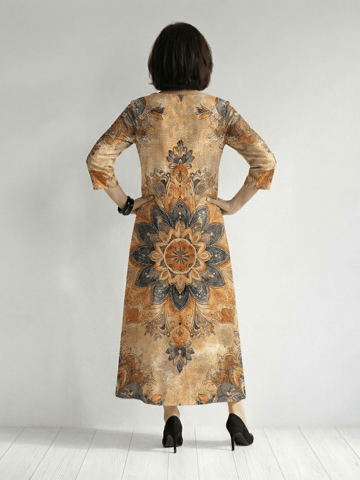Emma & Rose Cape Town Damon™ Gentle Floral Midi Dress, light fabric with soft floral pattern and sleeveless design.