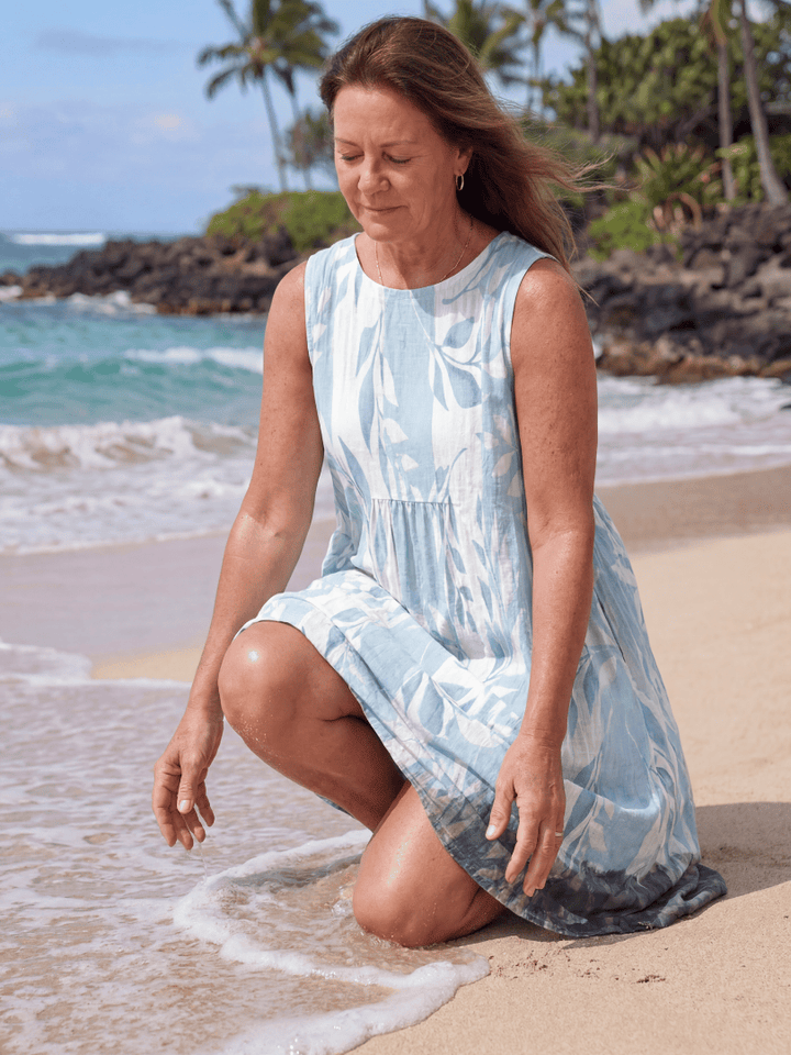Emma & Rose Cape Town Kamilia™ Quiet Shore midi dress in soft fabric with a flowing silhouette and elegant neckline.